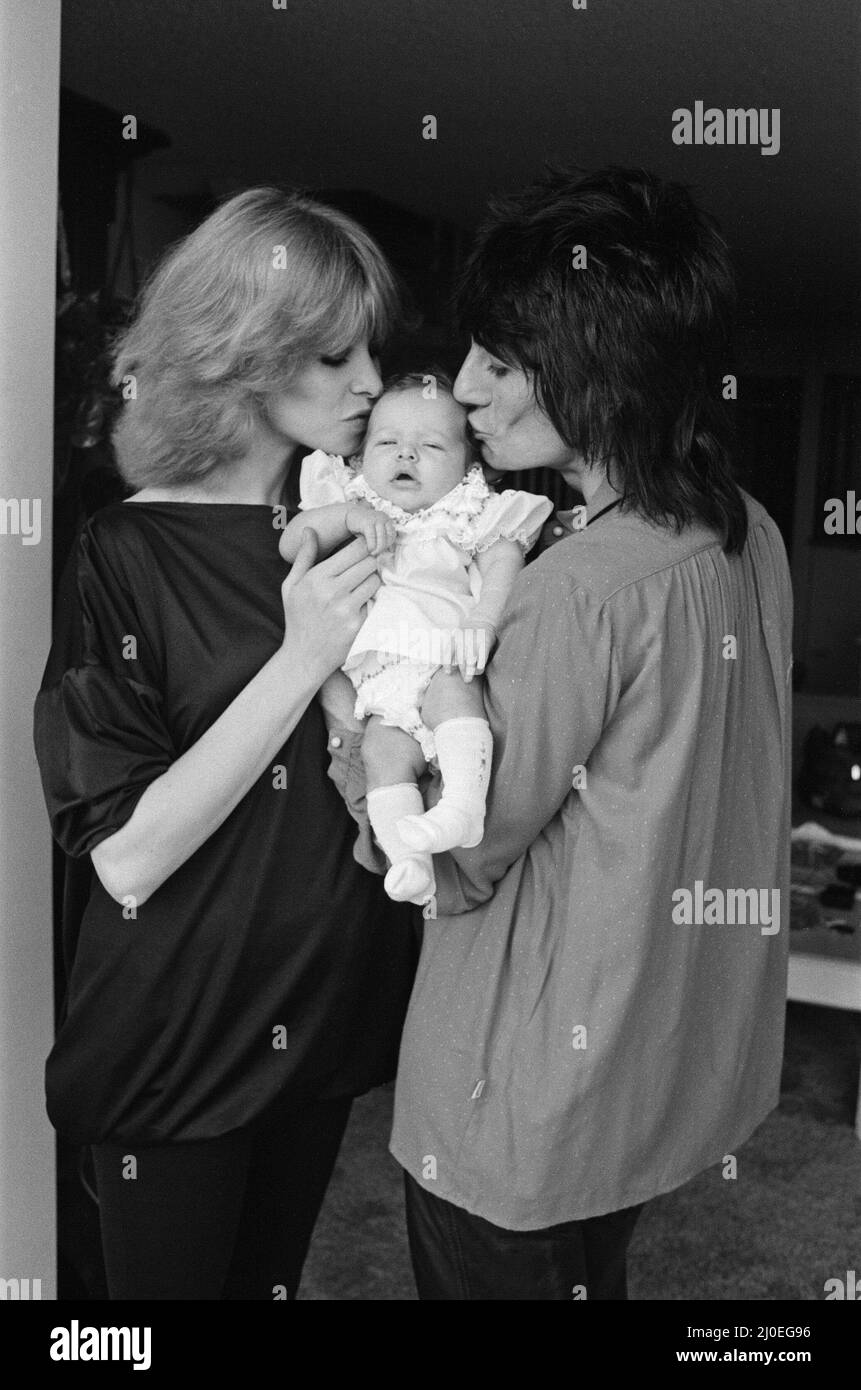 Ronnie Wood, his wife Jo Wood introduce their daughter Leah, aged 5 weeks old. They are in a Los Angeles, hotel, and not at their Malibu home after they were evacuated from it int he recent outbreak of fires in the area.  The home is now safe and they are due to return soon.  Picture taken 29th October 1978 Stock Photo