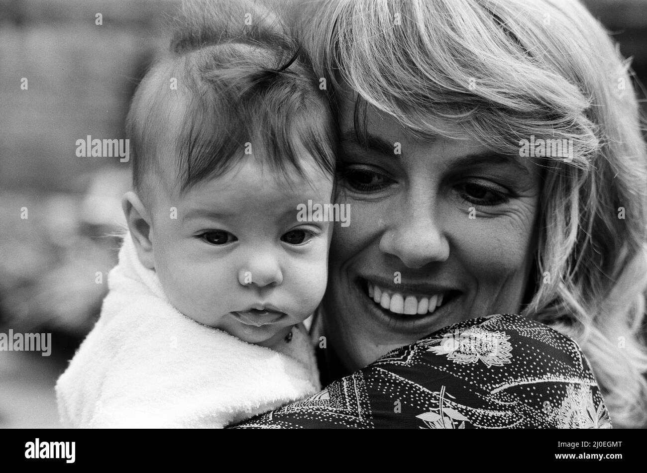 Esther Rantzen at home with her baby daughter Emily. 15th May 1978. Stock Photo