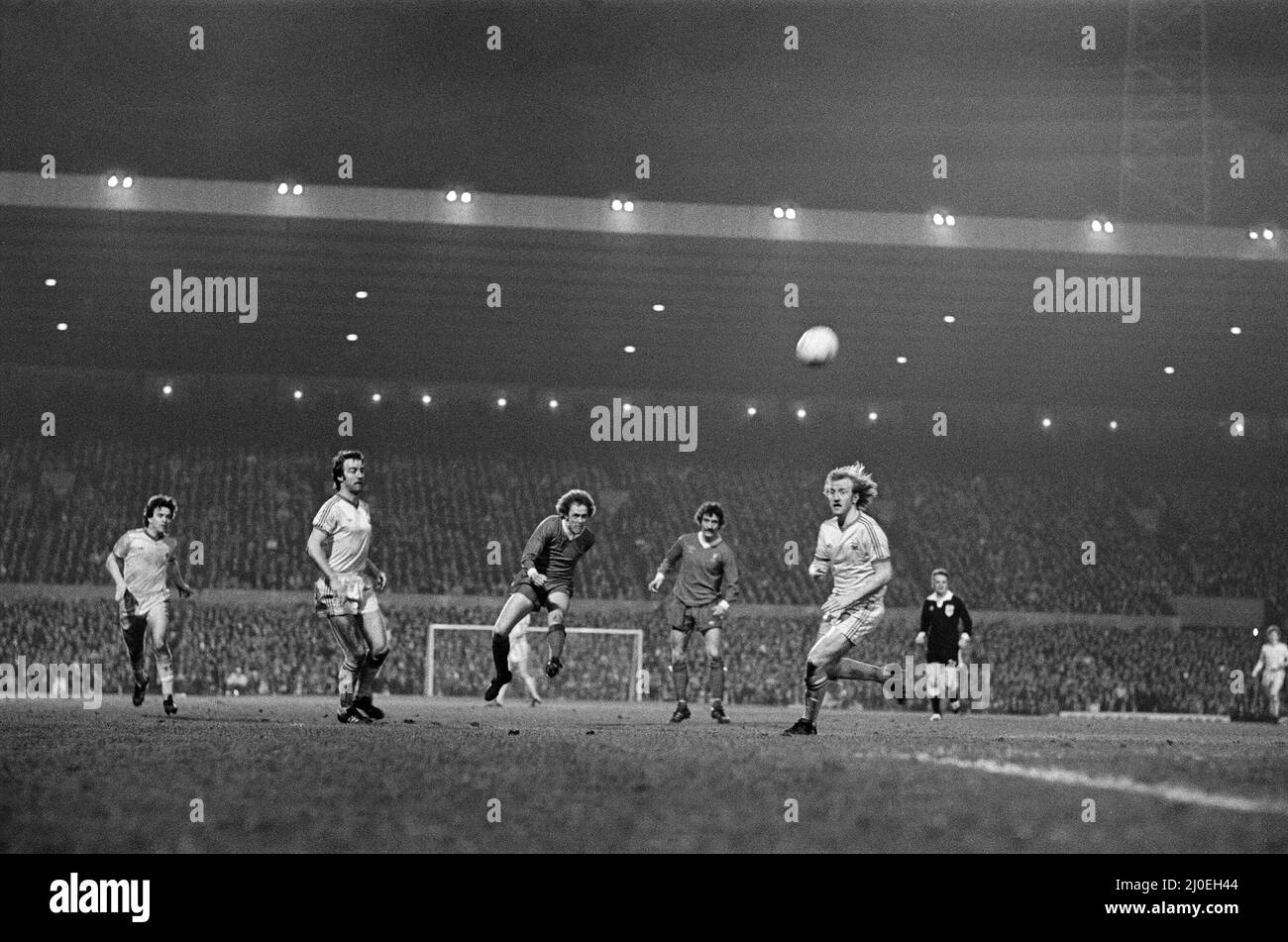The 1978 Football League Cup Final was the eighteenth League Cup final, and was contested between Liverpool and Nottingham Forest. The initial match resulted in a 0?0 draw at Wembley Stadium on 18 March 1978. The replay was four days later at Old Trafford, and saw John Robertson score from the penalty spot after a foul by Phil Thompson on John O'Hare, which TV replays confirmed was actually outside the penalty area.(Picture) Phil Neal (centre) has a shot on goal. 22nd March 1978 Stock Photo