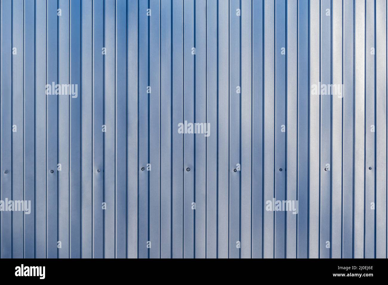 White and blue corrugated metal fence background Stock Photo - Alamy