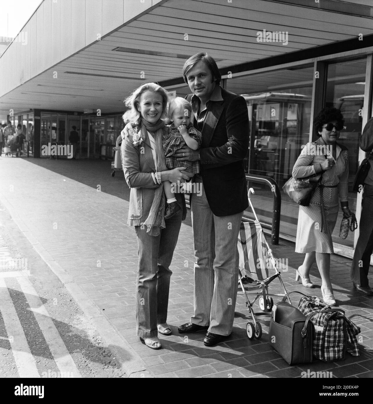 Juliet Mills with her daughter Melissa, aged one, and her husband Michael Miklenda leaving Heathrow Airport for New York. They have been here for a holiday, visiting Juliet's parents. 5th July 1979. Stock Photo