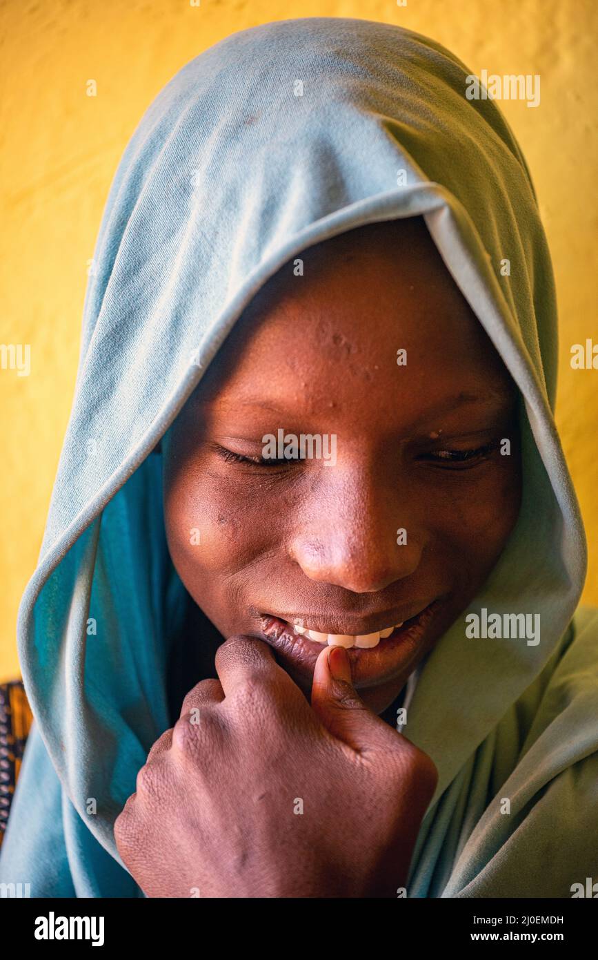 Portrait of a shy Mauritanian girl with veil, Zouerat, Mauritania Stock Photo