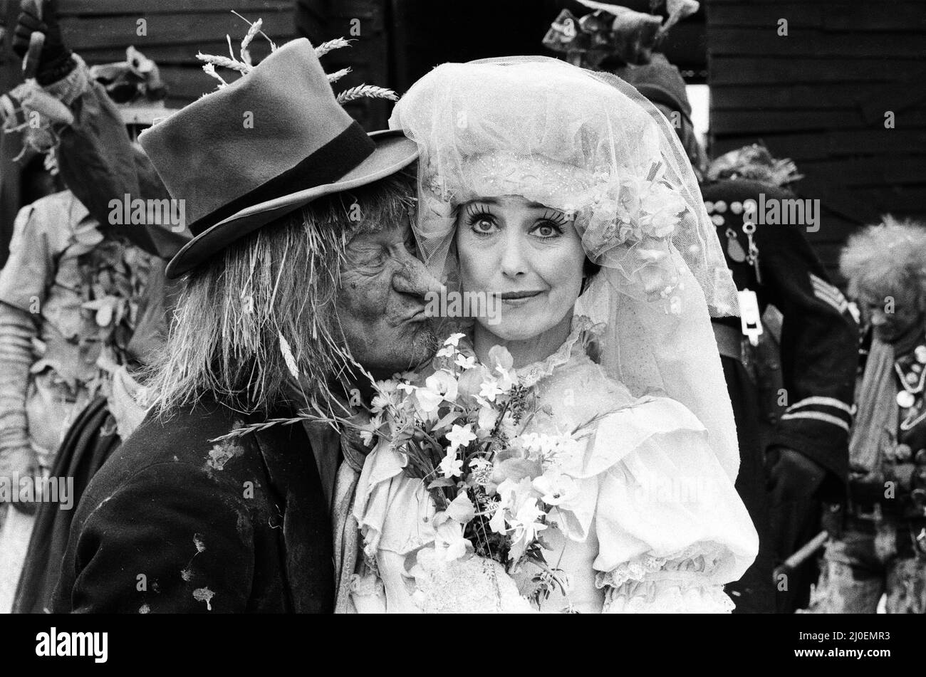 Television character Worzel Gummidge who is played by Jon Pertwee marries his Aunt Sally, played by Una Stubbs, in a barn at Braishfield, near Romsey, Hants. The guests at the wedding included Barbara Windsor, Bill Maynard with several scarecrows. 3rd July 1979. Stock Photo