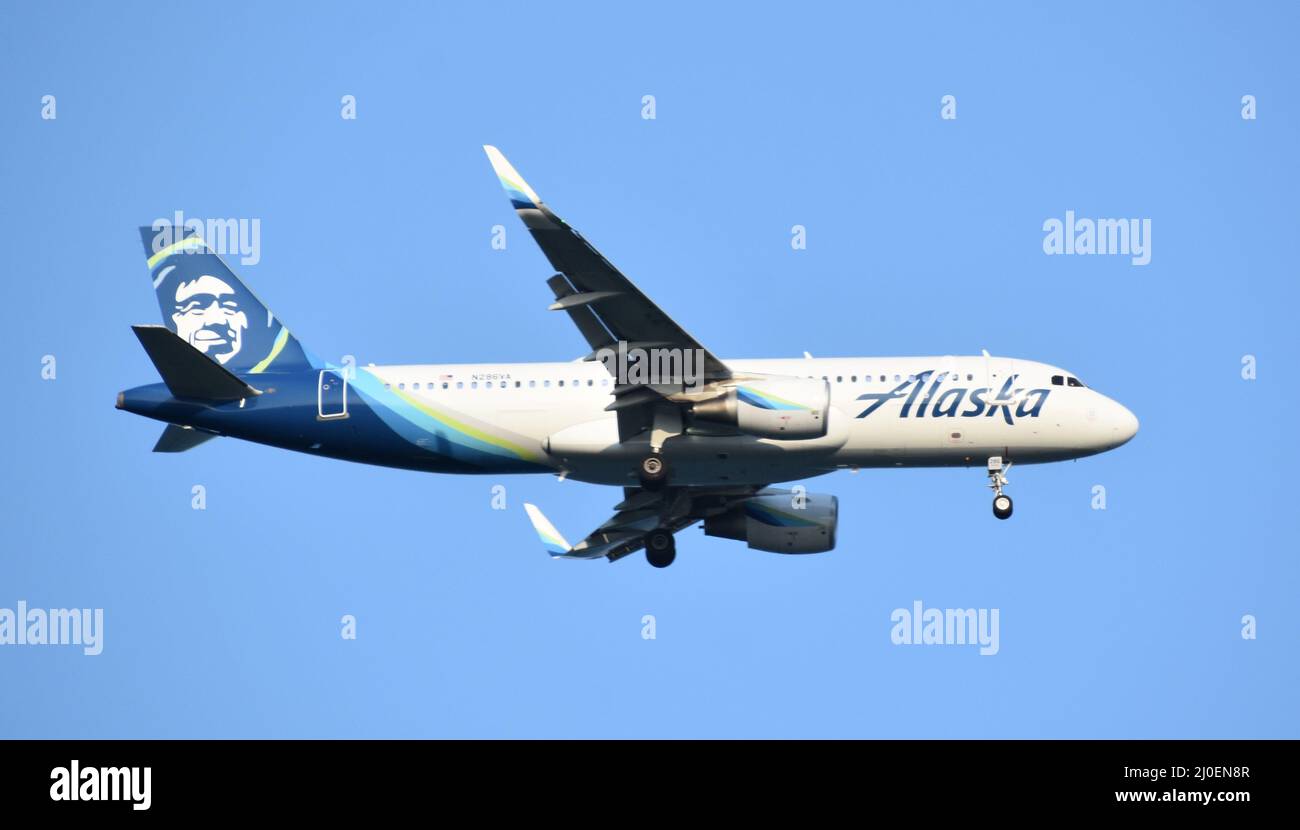 Alaska Airlines Airplane about to land at Boston Logan International Airport in Massachusetts Stock Photo