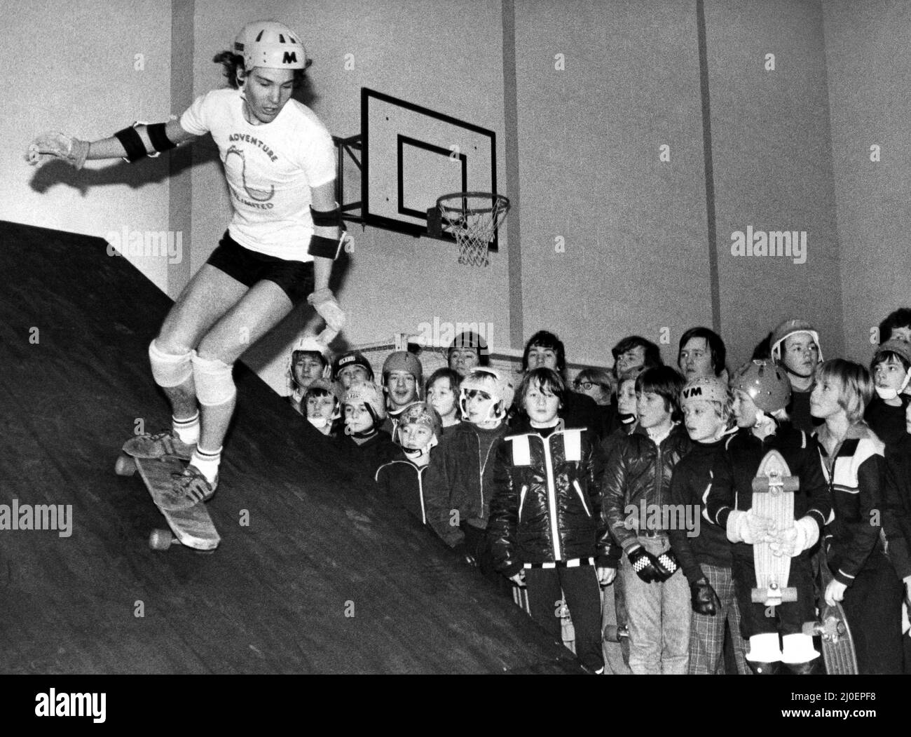 Mark Howard demonstrates his skateboarding skill to an appreciative audience at West Denton on 4th January 1978 Stock Photo