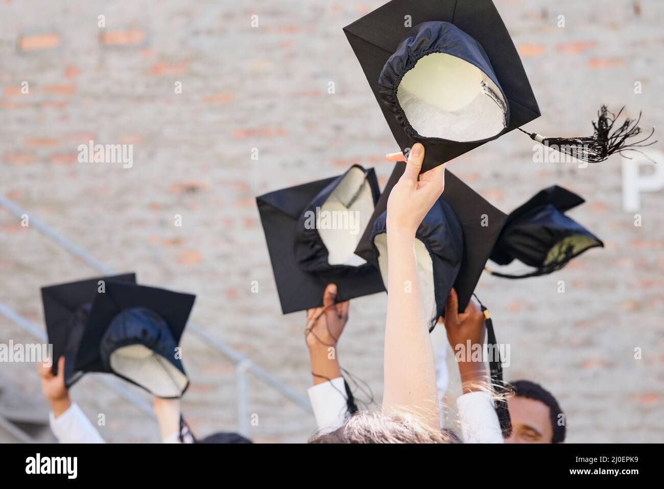 Graduation throwing hats in air hires stock photography and images Alamy