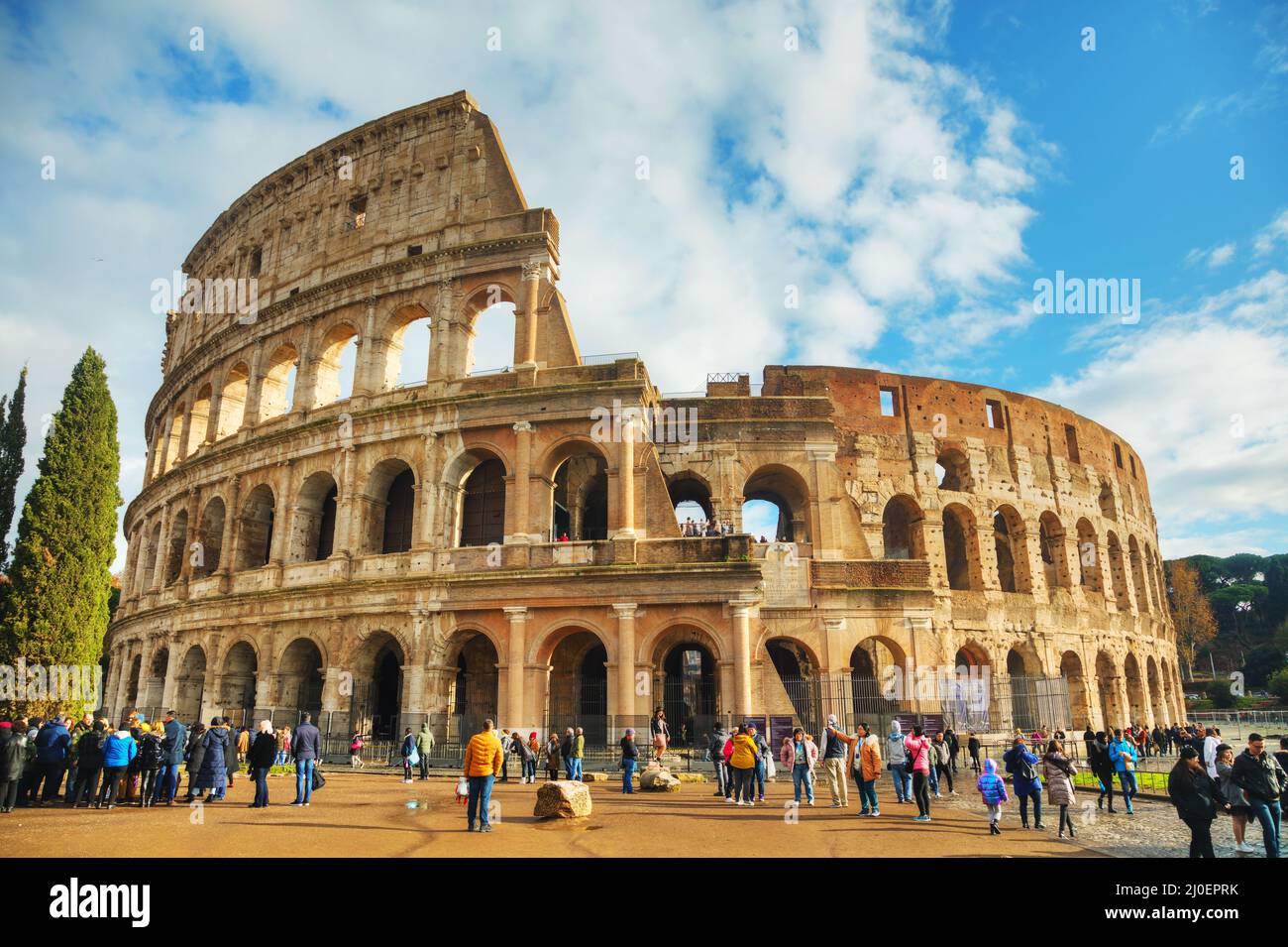 Colosseum or Flavian Amphitheatre with people Stock Photo