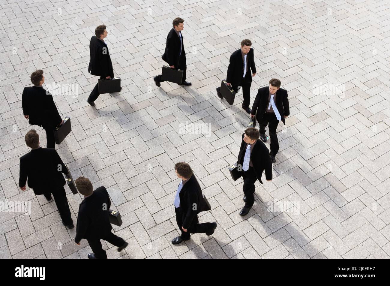 High view of a businessman walking round in circles Stock Photo Alamy