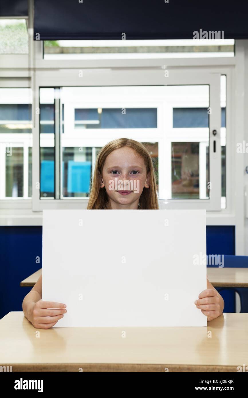 Kid holding placard hi-res stock photography and images - Alamy