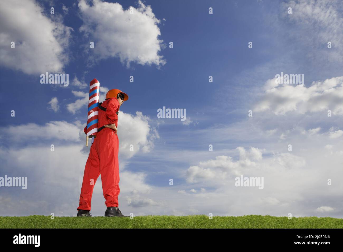A man with a rocket strapped to his back ready for take off Stock Photo