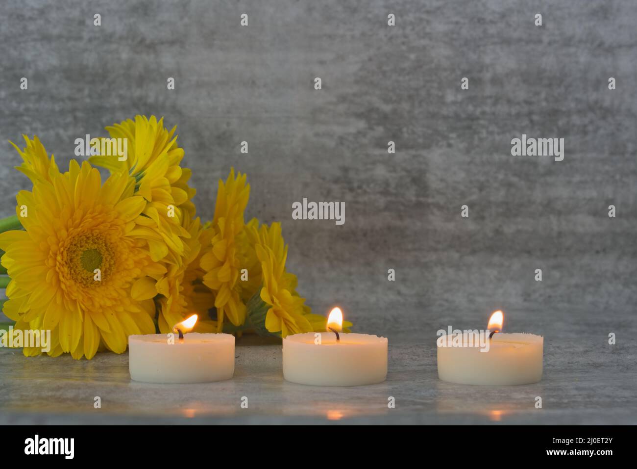 Burning tea light candles Stock Photo Alamy
