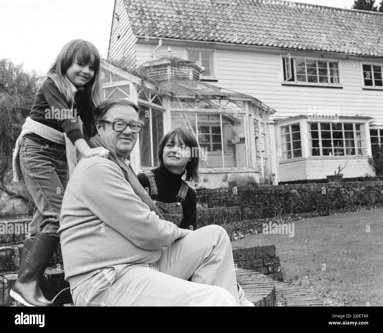 John Mortimer QC with his wife Penny and seven year old daughter Emily at their home in Turville Heath, Buckinghamshire  10th April 1979 Stock Photo