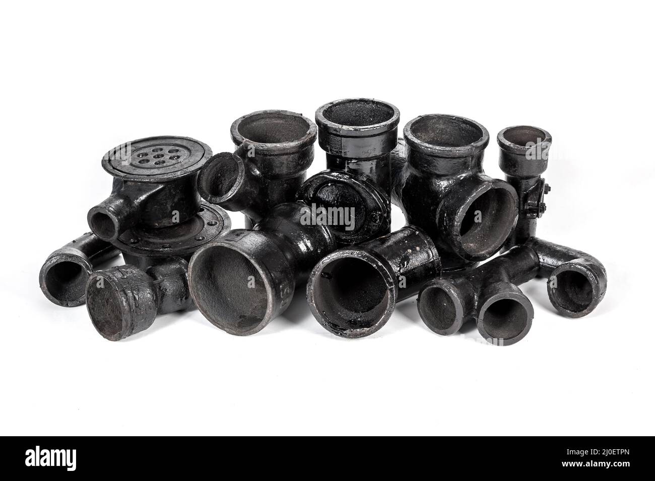 Different versions of cast iron sewer fittings and connections Stock