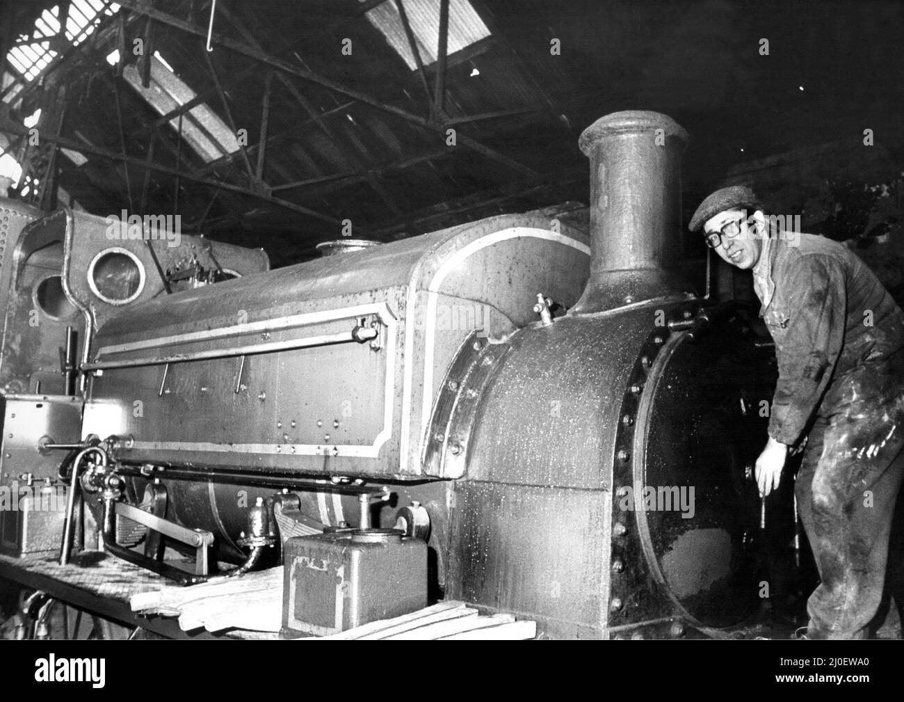 A rare rail relic bought by the Stephenson and Hawthorn Loco Trust has returned to its native North eAst to retire. The 106 year old steam engine, Wellington will be spending its days as a museum piece only a few miles from where it was built.  Mr. Eric Maxwell gets to work on the Engine on 30th January 1980 Stock Photo