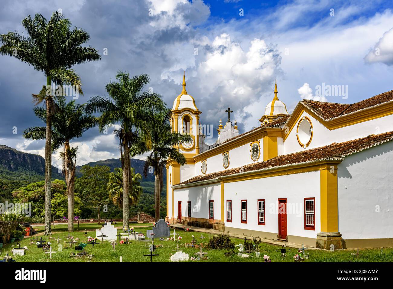 Old cemetery next to old colonial church in Tiradentes city Stock Photo