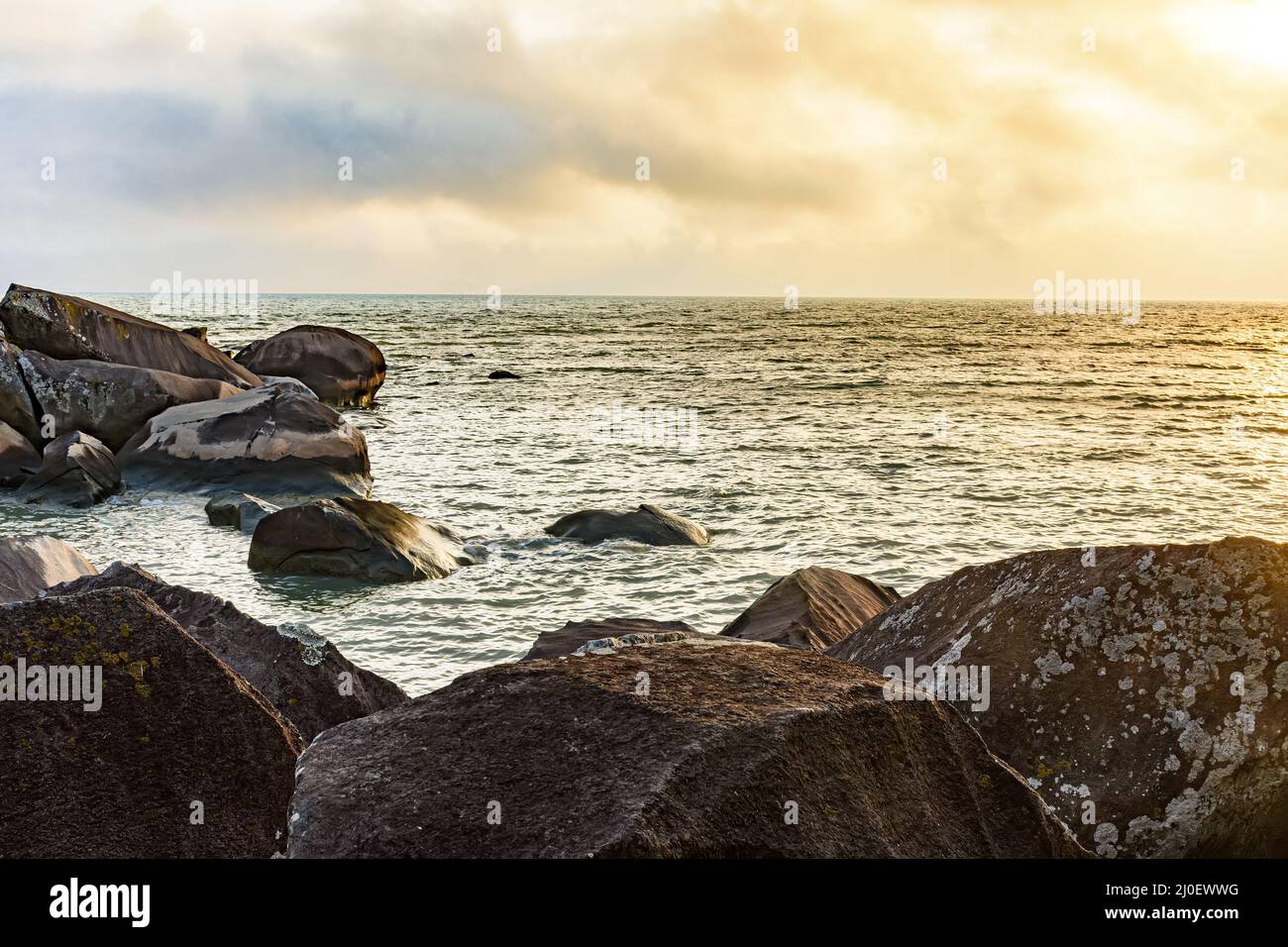 Sunset at the sea of Ilhabela tropical island Stock Photo