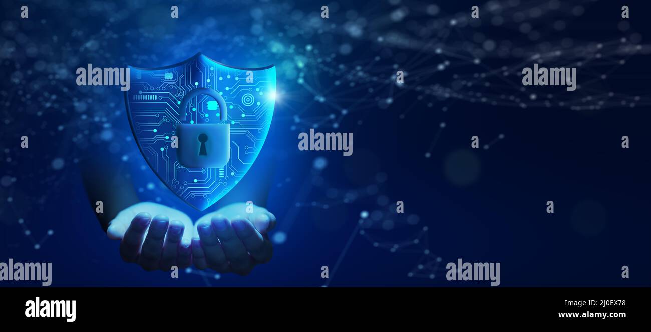 Business Hand holding Shield with Padlock icon and Network wireframe over blue background abstract. Cyber attack block, Cyber data, and Information. Stock Photo