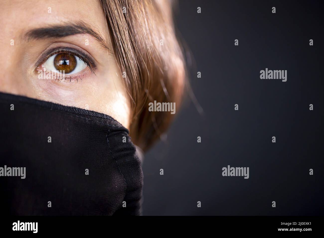 Woman wearing leather mask hi-res stock photography and images - Alamy