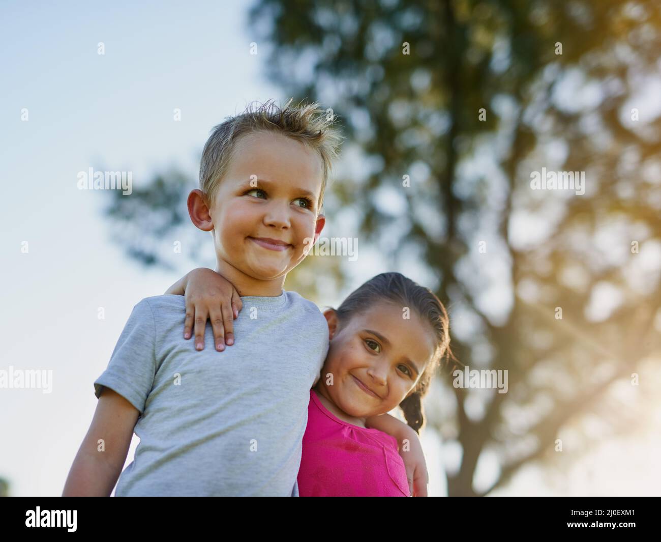 Siblings and best friends. Shot of a little brother and sister walking