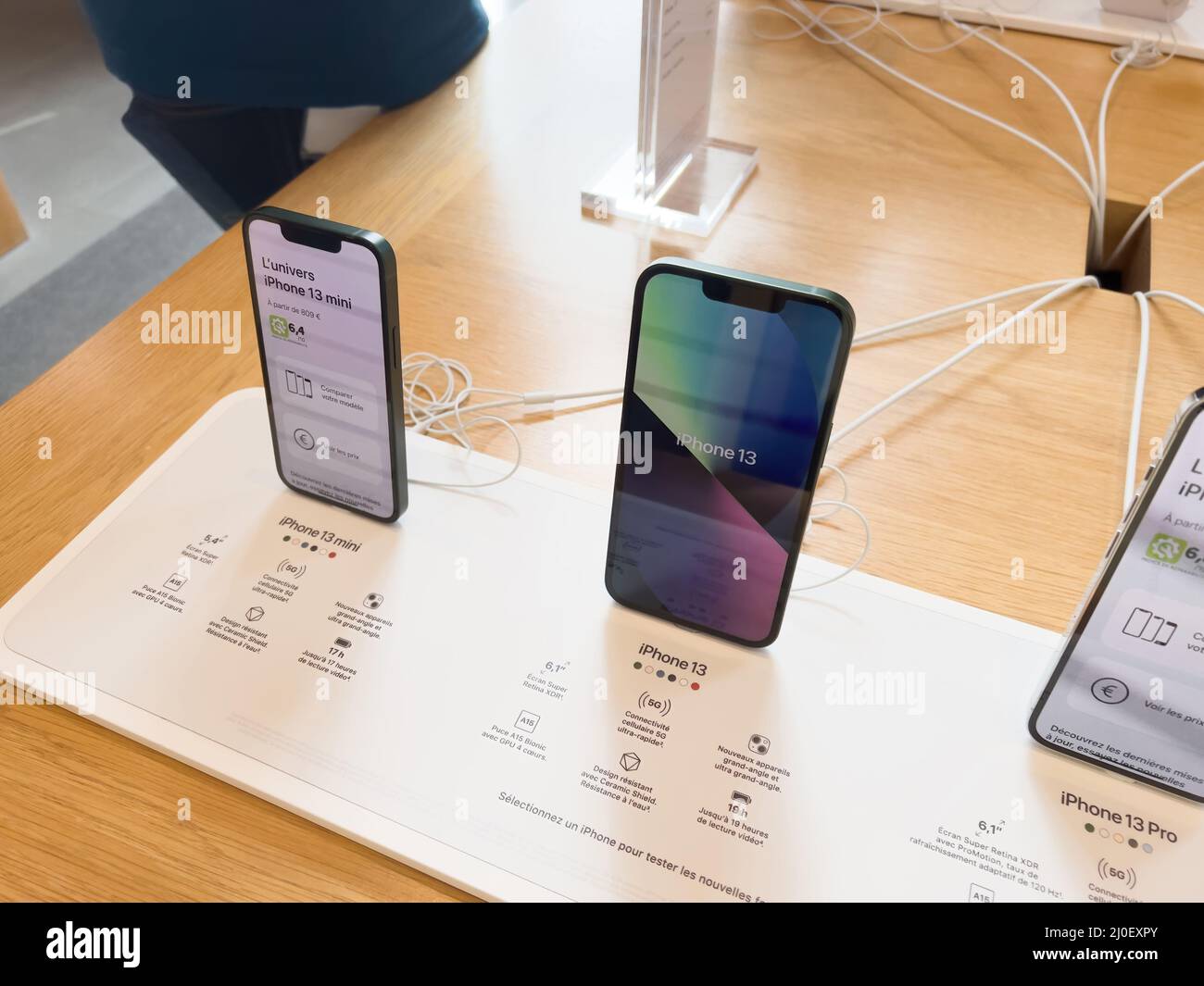 Paris, France - Mar 18, 2022: New iPhone 13 Mini in gorgeous green color on  table during the sales launch at the Apple Inc. flagship store Stock Photo  - Alamy
