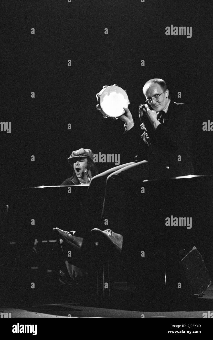 Elton John and Ray Cooper in concert at Birmingham Hippodrome. 21st April 1979. Stock Photo