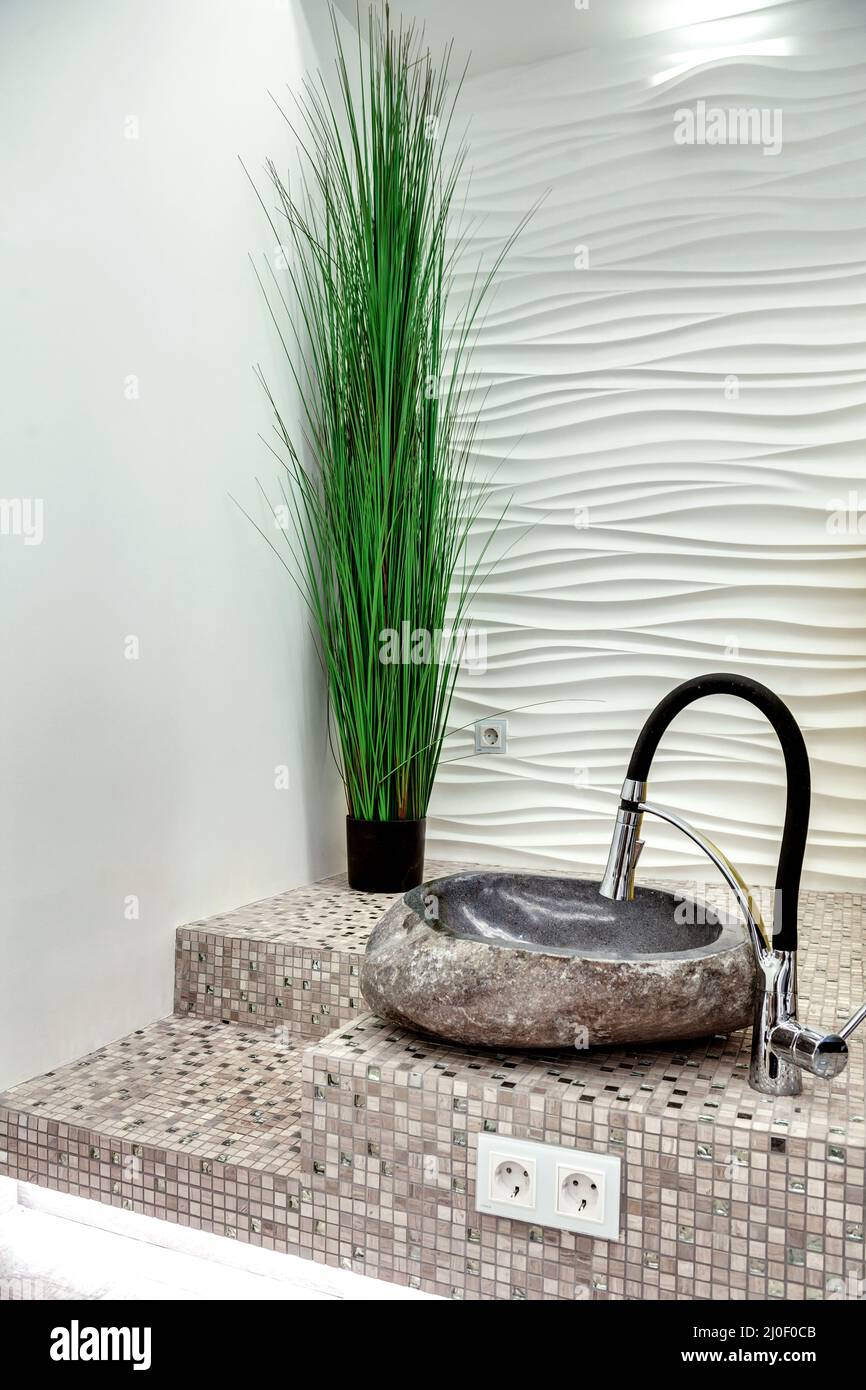 Stone sink for pedicure Stock Photo - Alamy