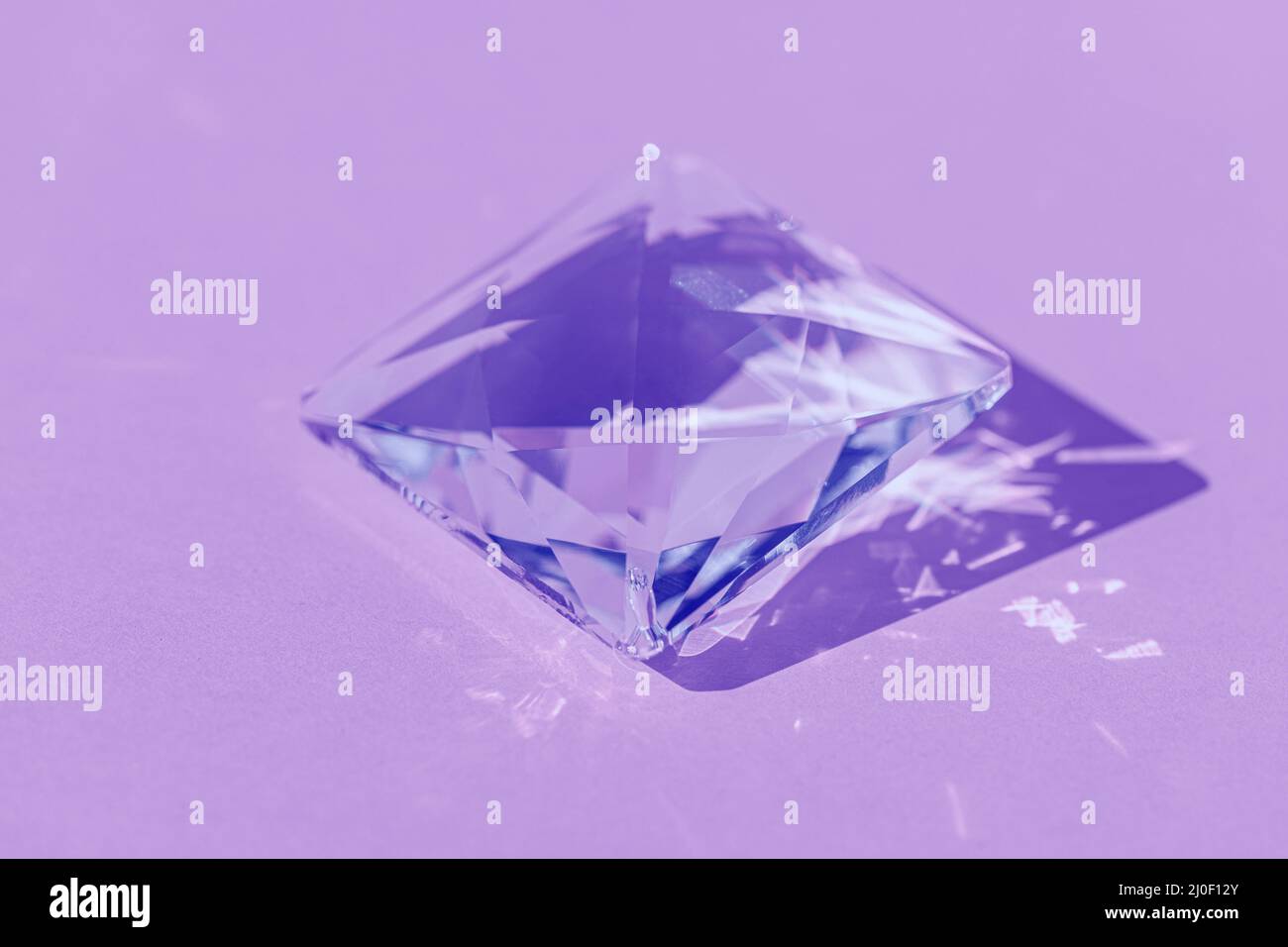 Light spectrum reflected through glass prism. Crystal prism with light