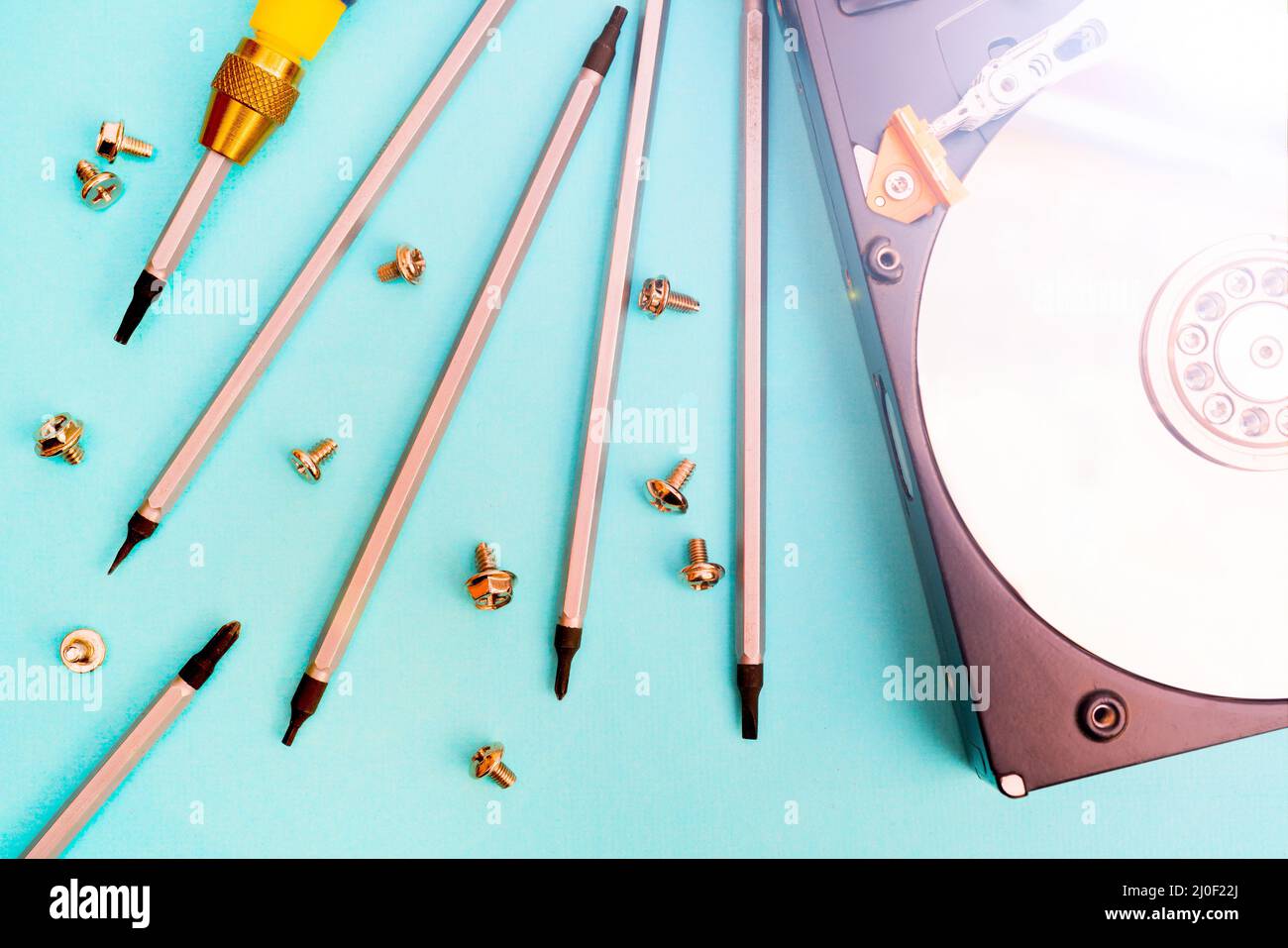 Set of screwdrivers for repair. Computer repair. Computer hard drive Stock Photo Alamy