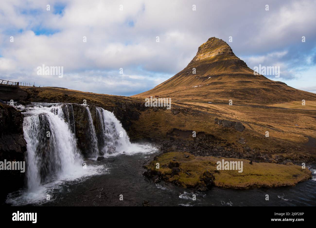 Kirkjufell mountain and the kirkjufellfoss waterfall Iceland St…