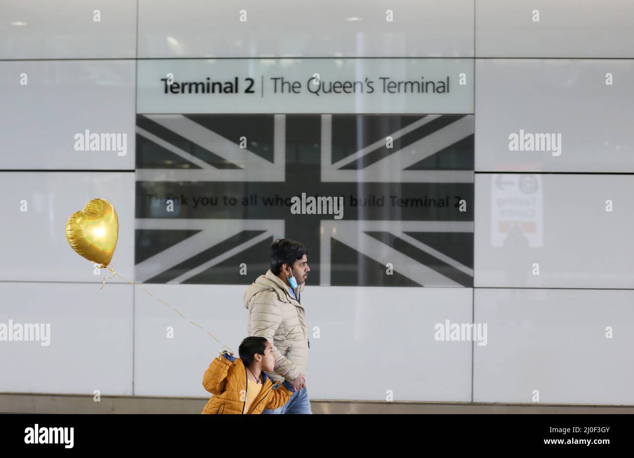 London, UK. 18th Mar, 2022. Passengers walk in Heathrow Airport in London,  UK, March 18, 2022. The British government removed all remaining COVID  restrictions on international travel for all passengers from 4