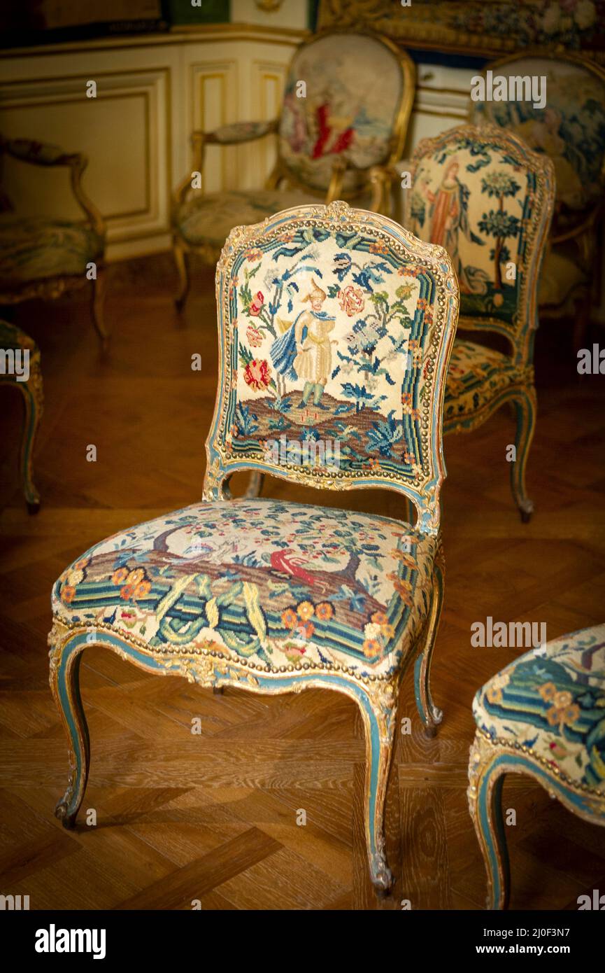 Louis XIV style chair in a palace interior Stock Photo - Alamy