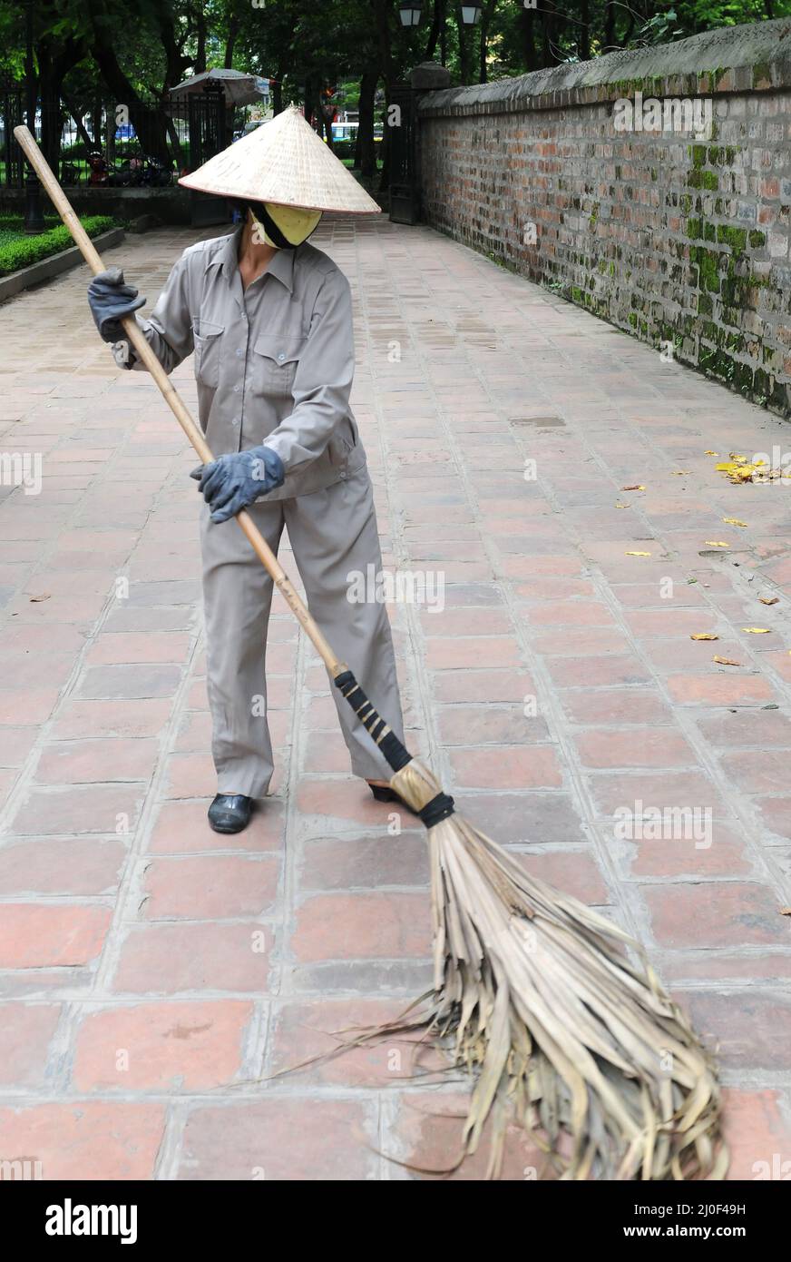 Woman street sweeper in hanoi, Vietnam Stock Photo Alamy