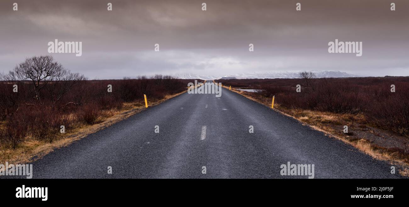 Rural road in snowy mountains hi-res stock photography and images - Alamy