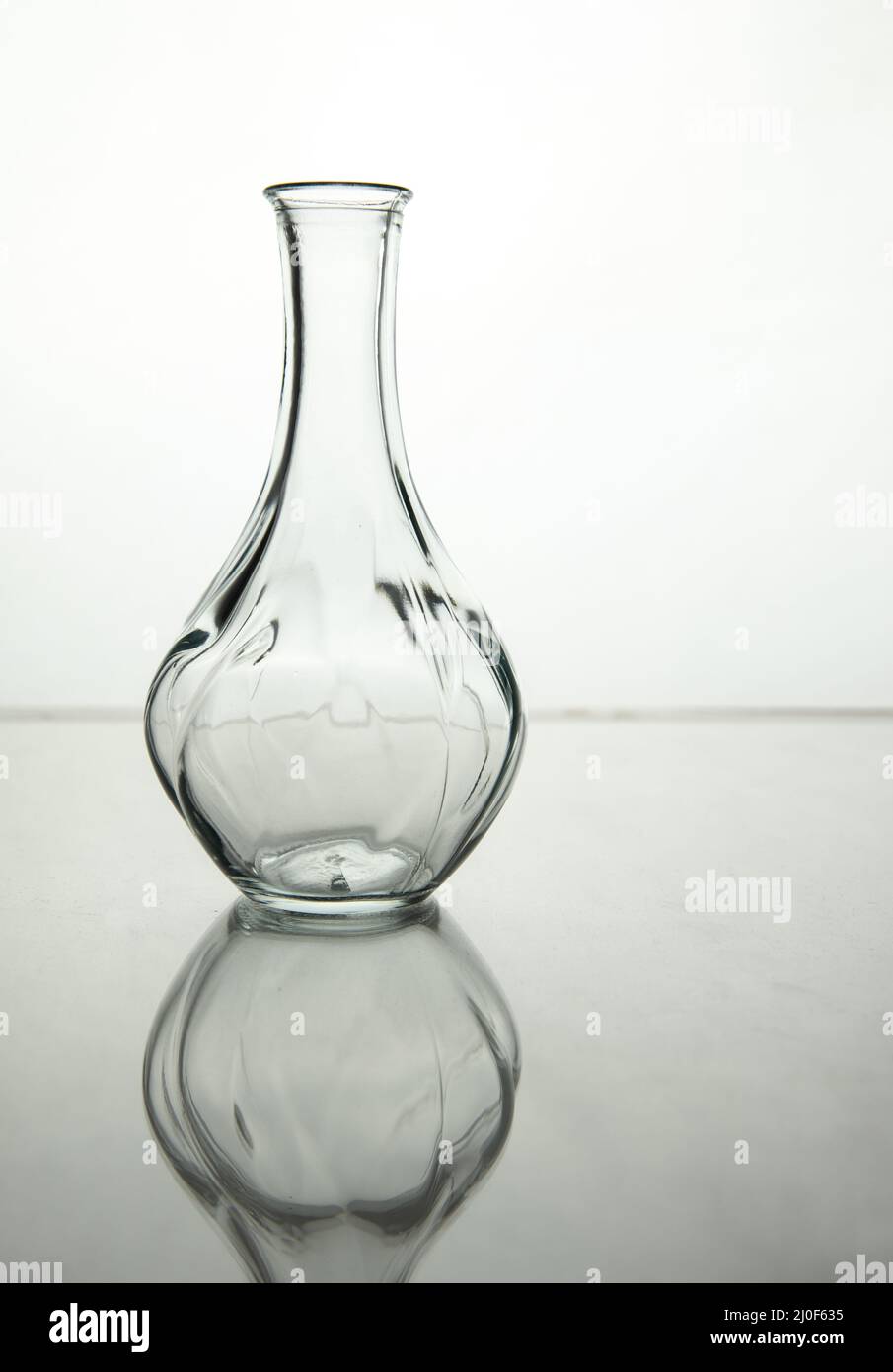Empty decorative glass vase. Creative Still-Life Photography Stock Photo
