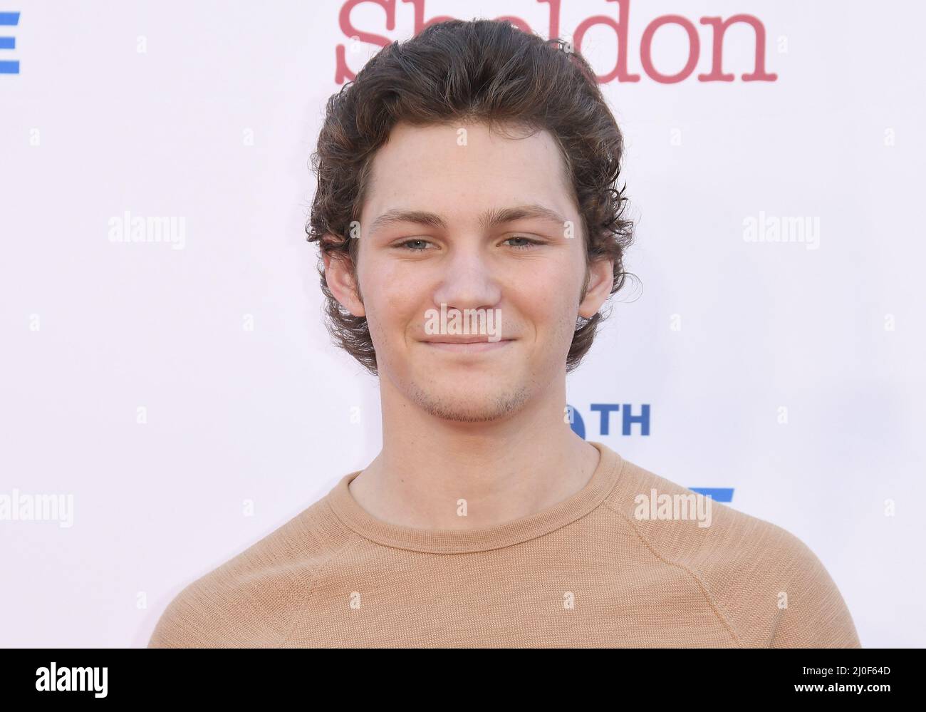 Montana Jordan arrives at the Premiere Of Warner Bros. 100th Episode Of