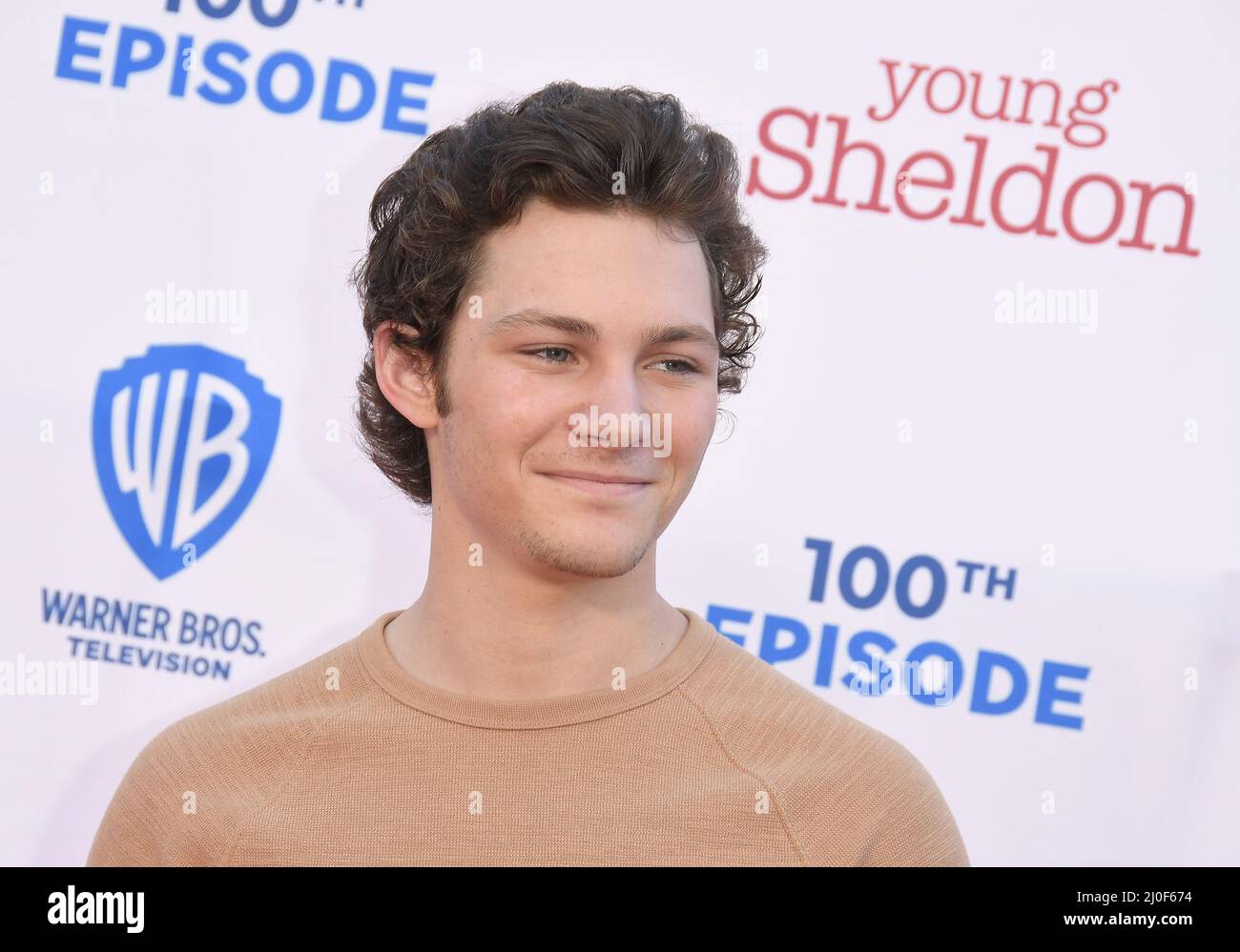 Montana Jordan arrives at the Premiere Of Warner Bros. 100th Episode Of
