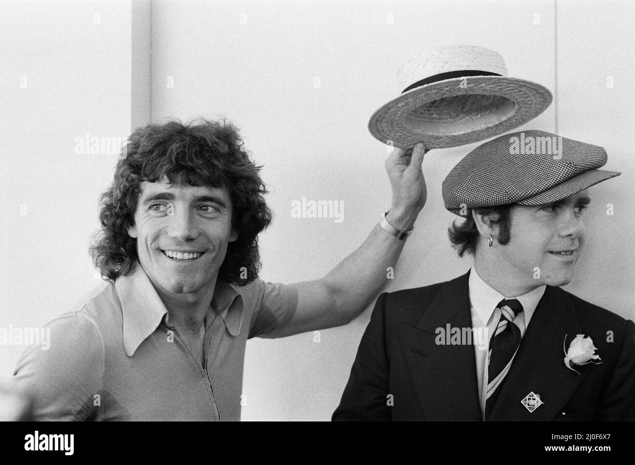 Kevin Keegan in a straw boater hat and 