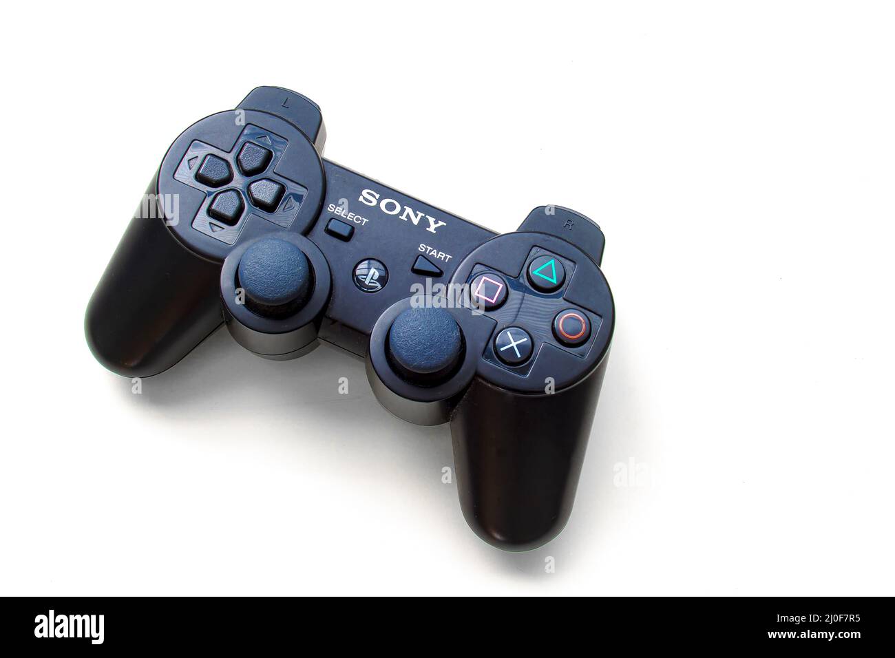 Calgary, Alberta, Canada. July 20, 2020. Black Sony Play Station control remote on a white background Stock Photo