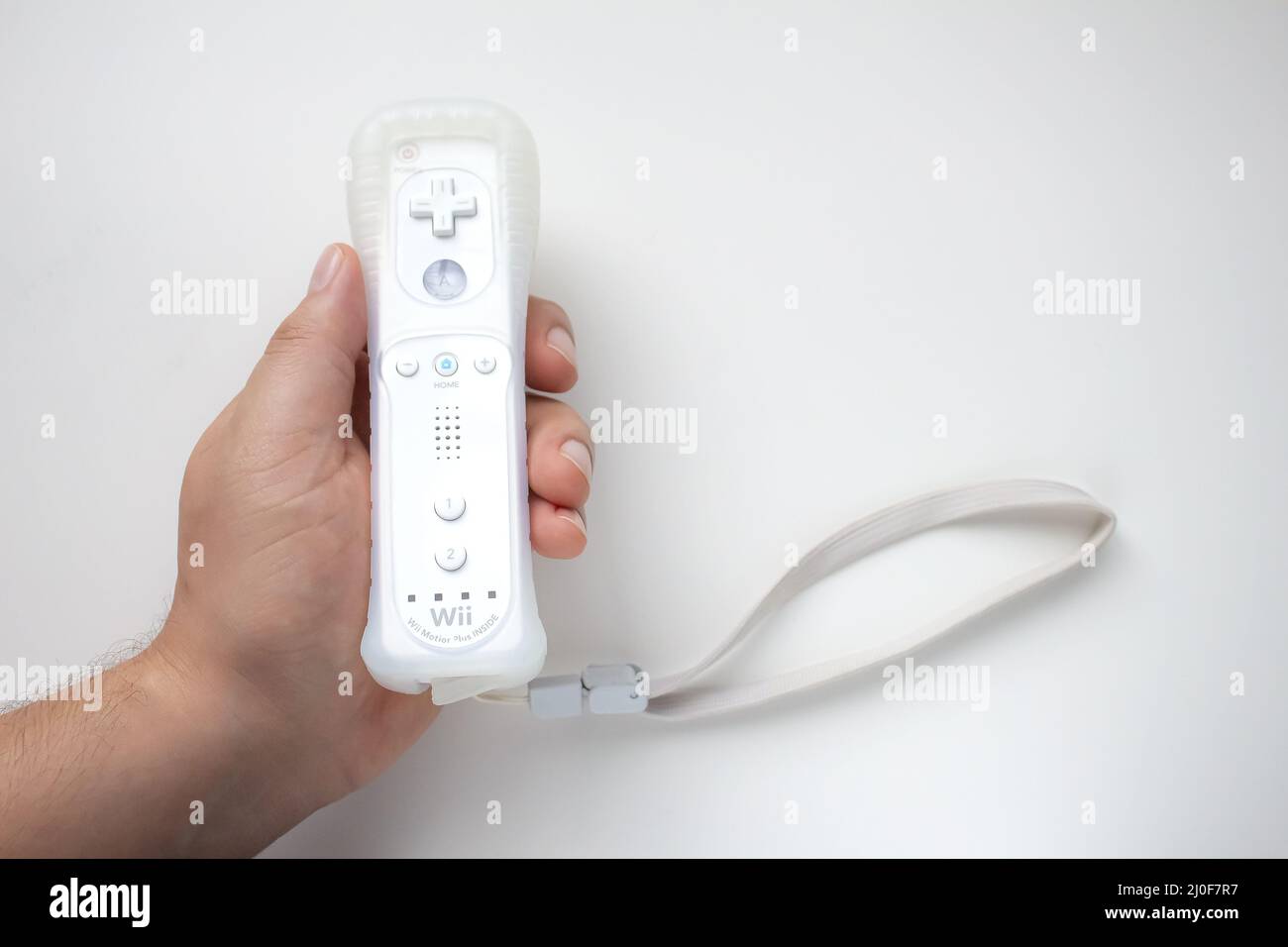 Person using remote control hi-res stock photography and images - Alamy