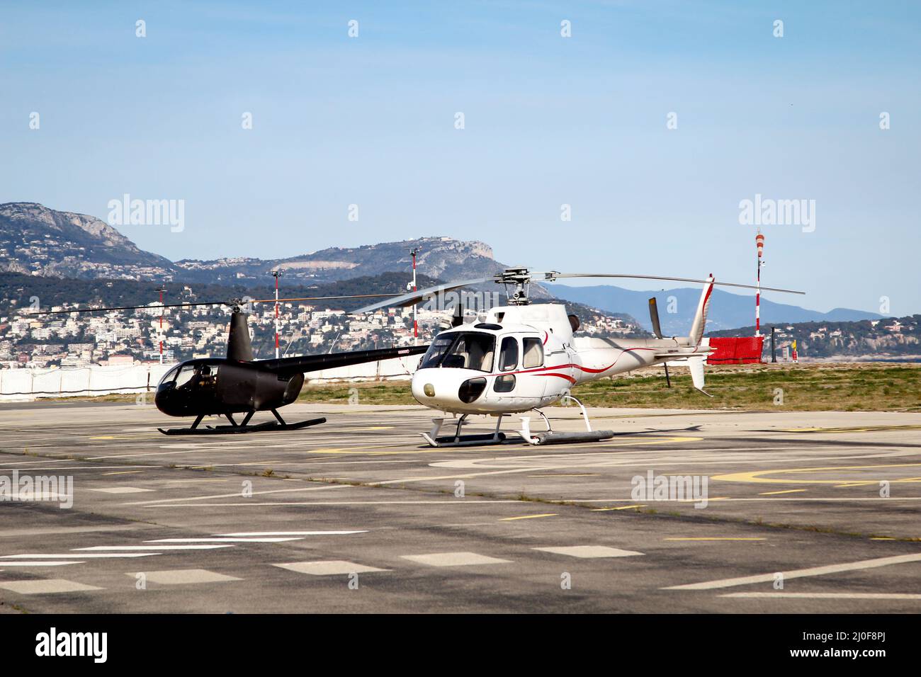 A helicopter with two main rotor blades at takeoff Stock Photo Alamy