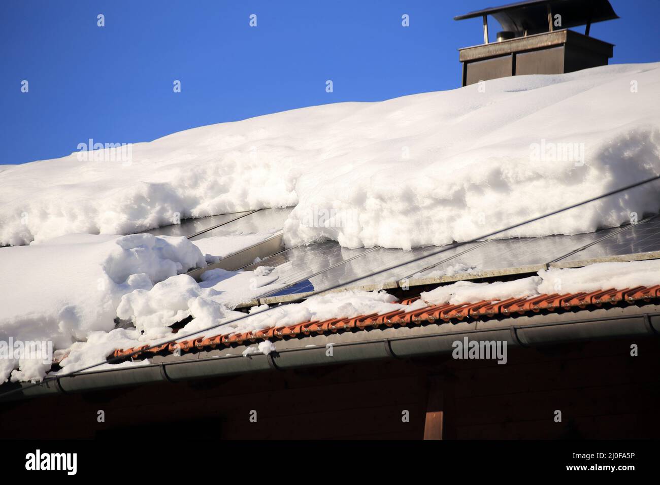 Some snow on roof top Stock Photo