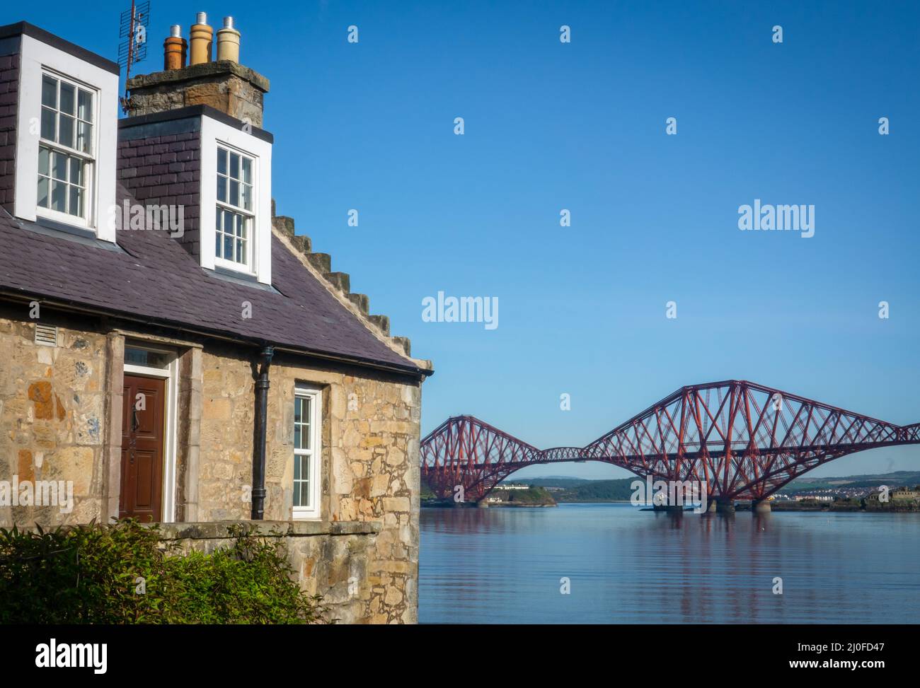 Rural Home With The Forth Bridge Behind Stock Photo