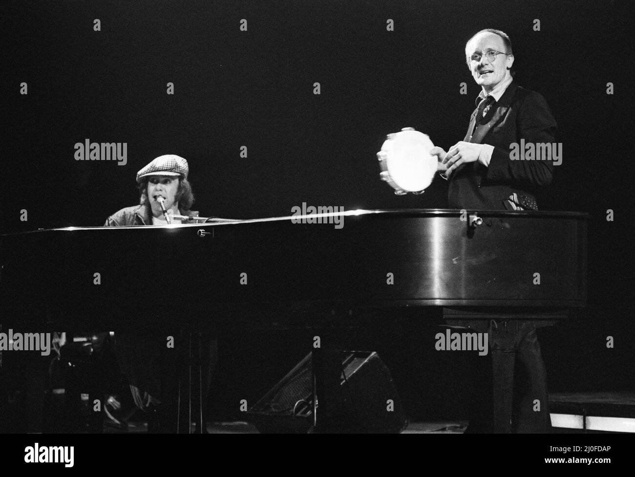 Elton John and Ray Cooper in concert at Birmingham Hippodrome. 21st April 1979. Stock Photo
