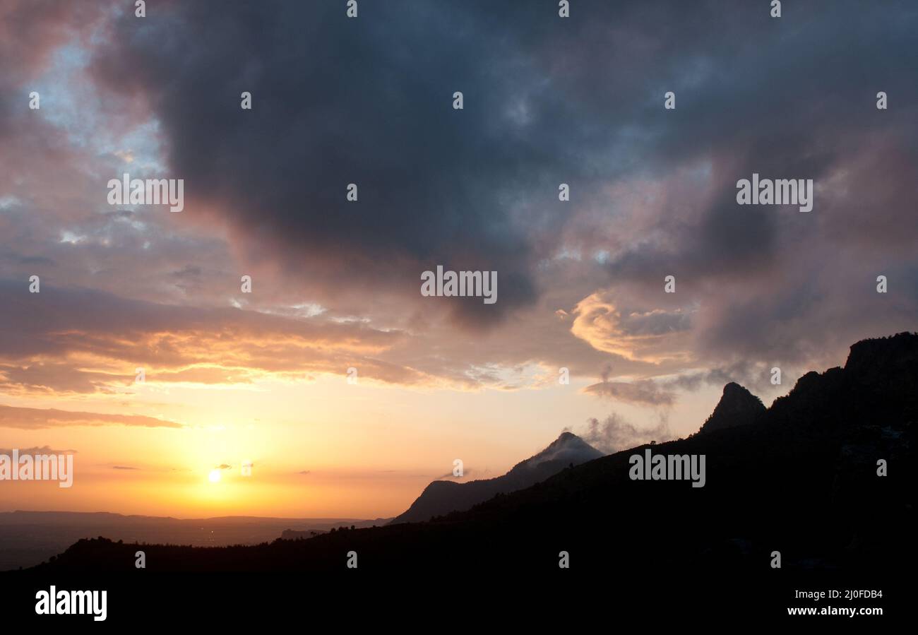 Mountain range and Dramatic stormy sky Stock Photo