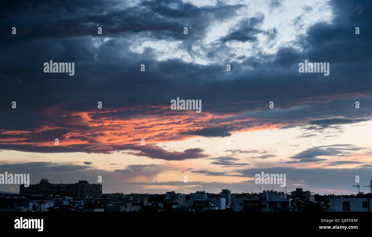 Dramatic stormy sky with colorful clouds. Stock Photo