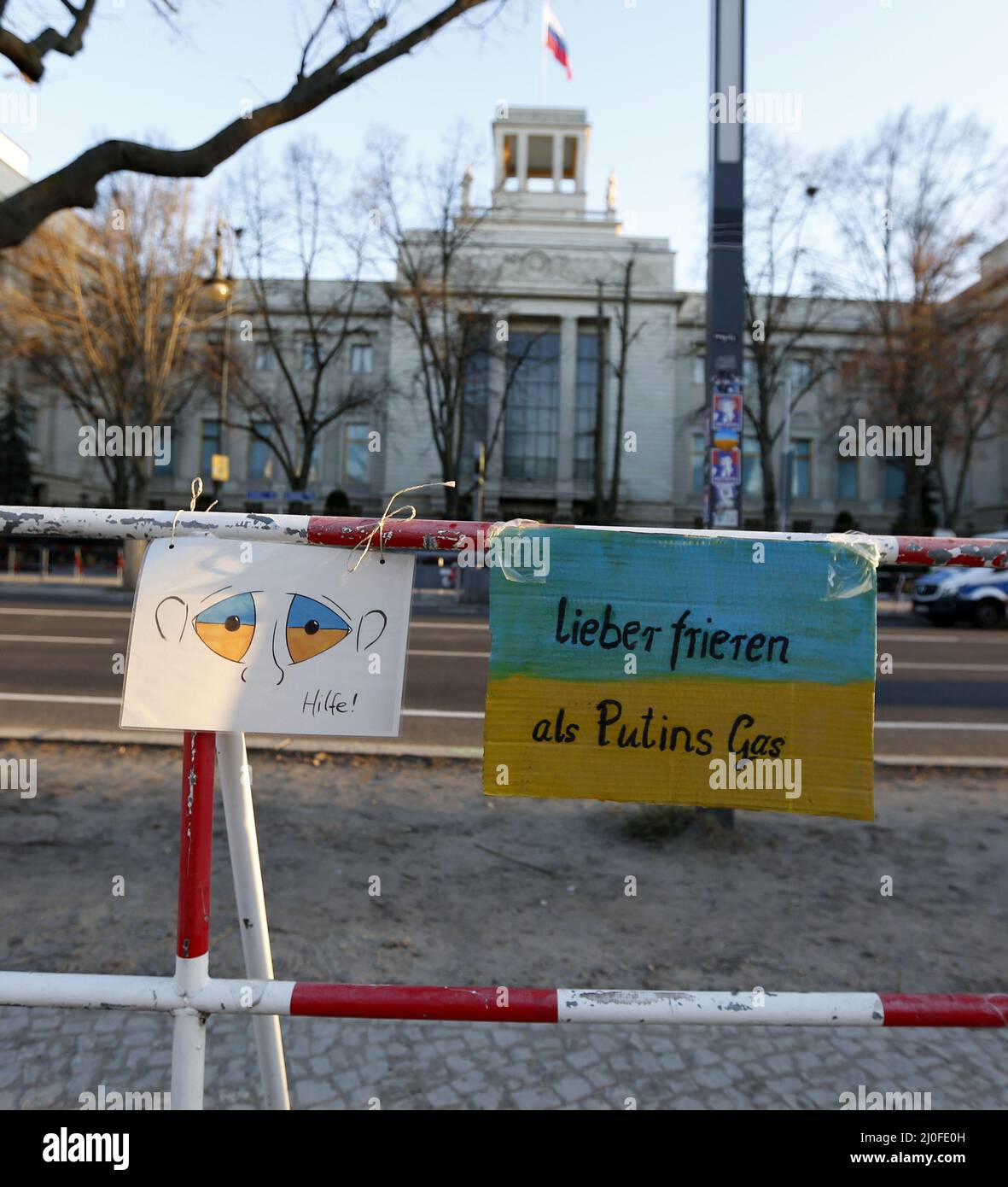 Berlin, Mitte, Germany. 18th Mar, 2022. Protest and posters against the war in Ukraine and candles for the victims of the war in Ukraine in front of the Embassy of the Russian Federation on Unter den Linden in Berlin-Mitte. Stock Photo
