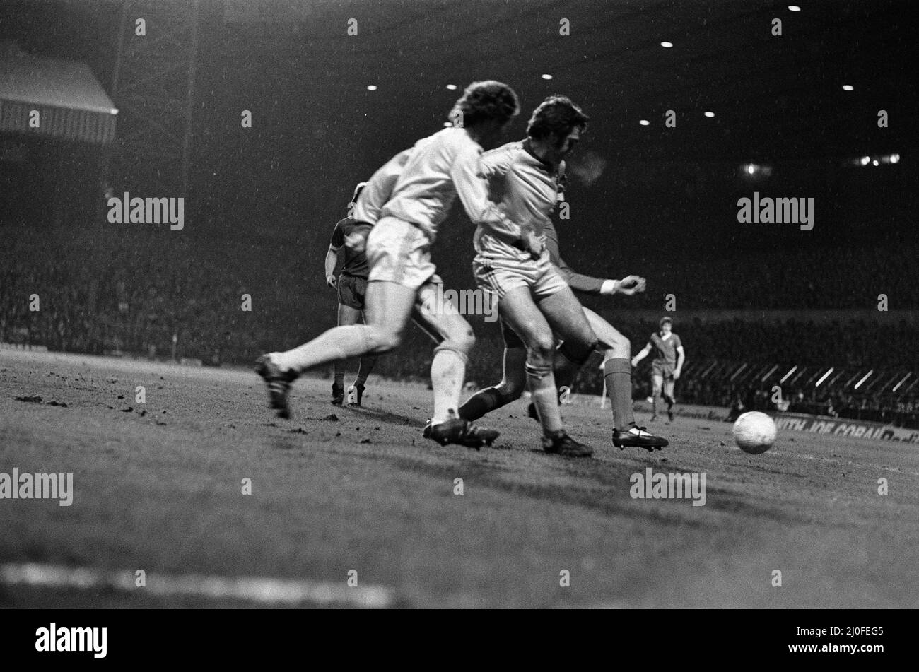 The 1978 Football League Cup Final was the eighteenth League Cup final, and was contested between Liverpool and Nottingham Forest. The initial match resulted in a 0?0 draw at Wembley Stadium on 18 March 1978. The replay was four days later at Old Trafford, and saw John Robertson score from the penalty spot after a foul by Phil Thompson on John O'Hare, which TV replays confirmed was actually outside the penalty area.(Picture) players contesting the ball. 22nd March 1978 Stock Photo
