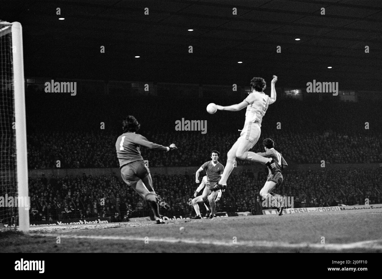 The 1978 Football League Cup Final was the eighteenth League Cup final, and was contested between Liverpool and Nottingham Forest. The initial match resulted in a 0?0 draw at Wembley Stadium on 18 March 1978. The replay was four days later at Old Trafford, and saw John Robertson score from the penalty spot after a foul by Phil Thompson on John O'Hare, which TV replays confirmed was actually outside the penalty area.(Picture) Tony Woodcock has an effort on the Liverpool goal. 22nd March 1978 Stock Photo