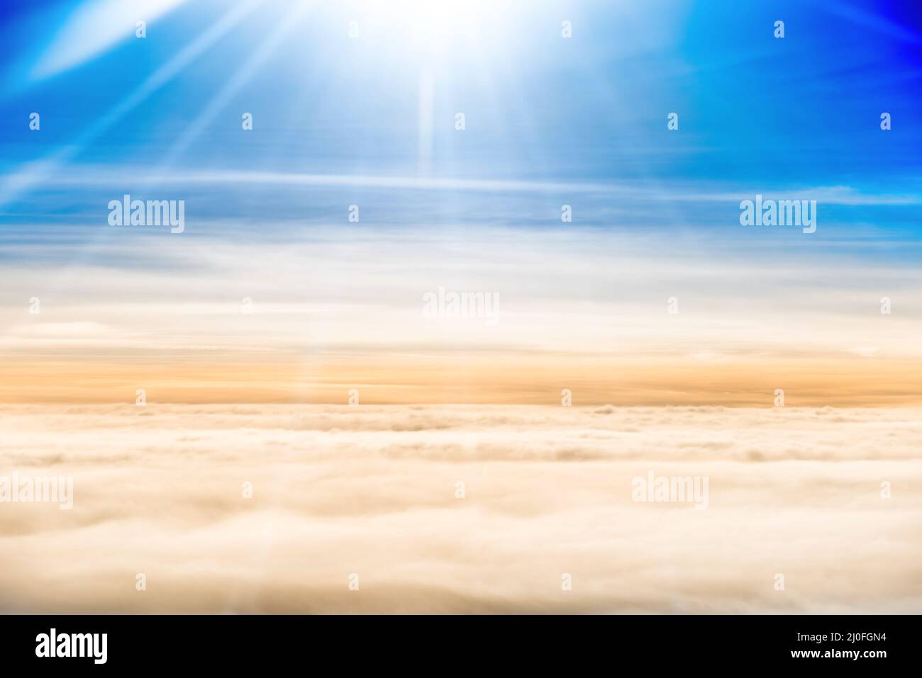 Beautiful airview with blue sky, white clouds and sunrays Stock Photo