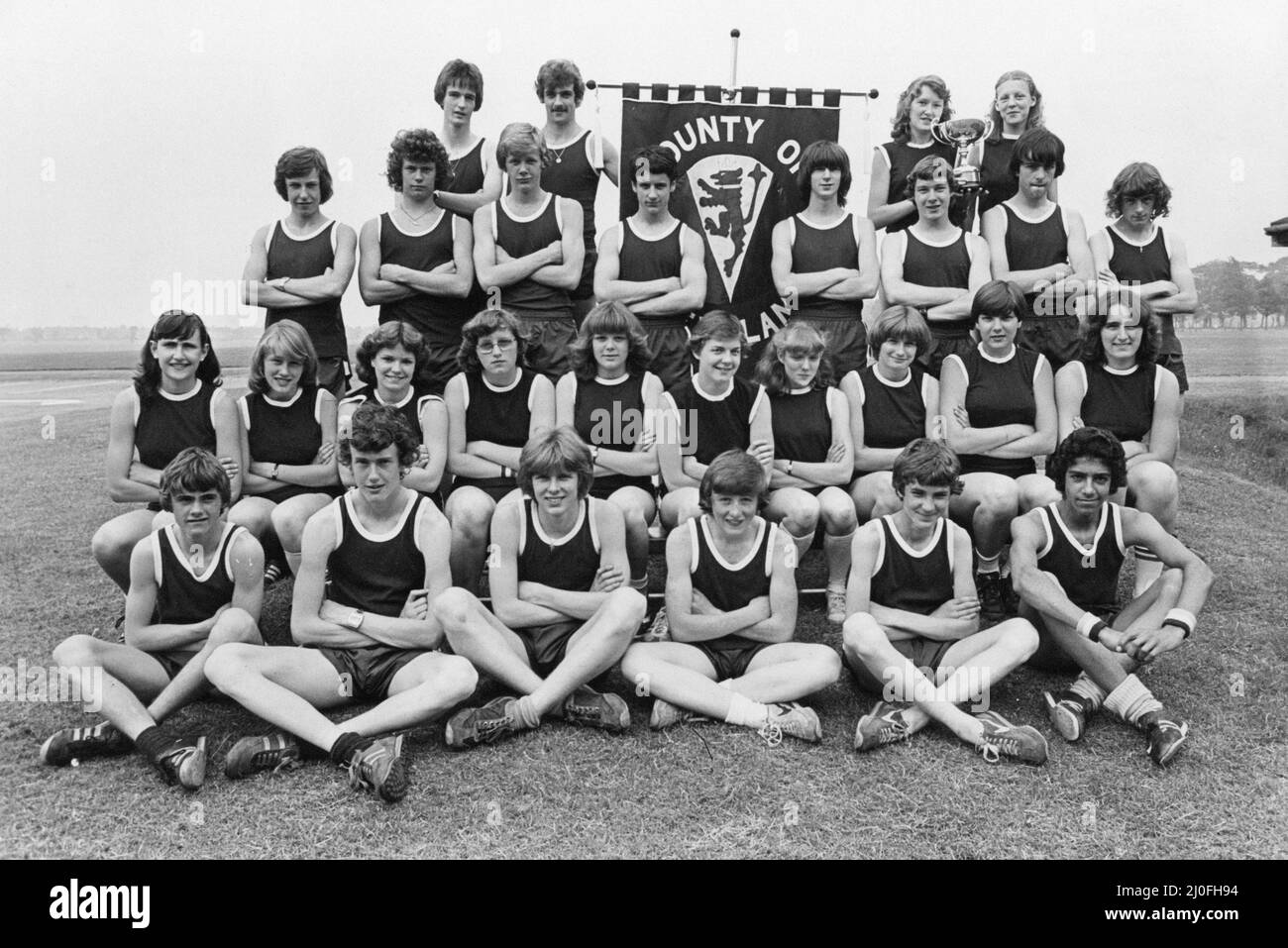 Members of Cleveland Schools Athletics Association who will be competing in the English Schools National Track and Field Championships (Harvey Maddon Stadium, Bilborough, Nottingham July 6th and 7th) pictured during break in training, 20th July 1979. Front Row L to R. Stephen Bell, Mark Chambers, Andrew Hainsworth, Martin Peevor, James Yeats, Stephen Smailes. Second Row L to R. Catherine Walker, Louise Kell, Tracy Banks, Alison Hall, Alison Eddy, Pamela Harkness, Iona Moorby, Nina Griffiths, Kendra Lowe, Diane Ashworth. Third Row L to R. Peter Carling, Mark Robinson, David Walker, Francis O'Co Stock Photo